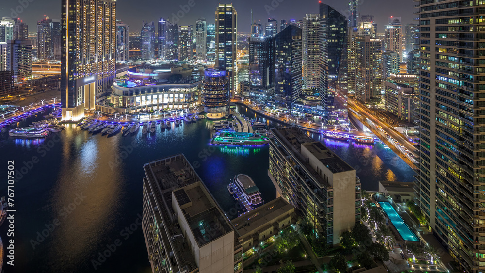 Night illumination of Dubai Marina aerial timelapse, UAE.