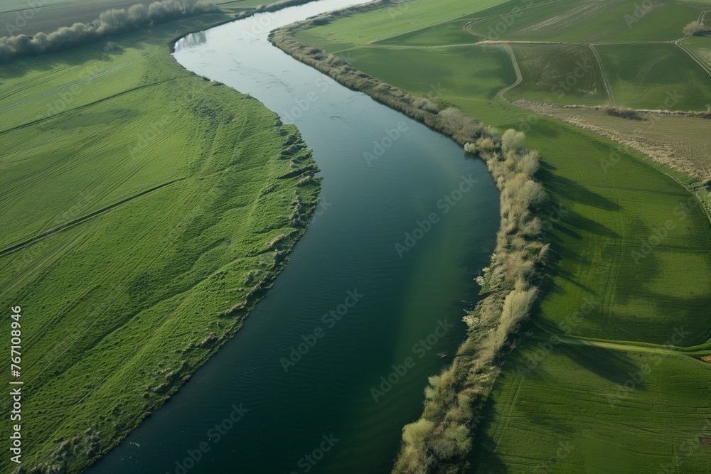 aerial shot of a river acting as a natural border aerial shot of a river acting as a natural border