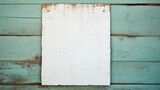 Blank paper sheet on old blue wooden wall.