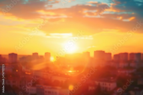 Warm golden hour sunset over city rooftops with blurred summer sky, abstract background