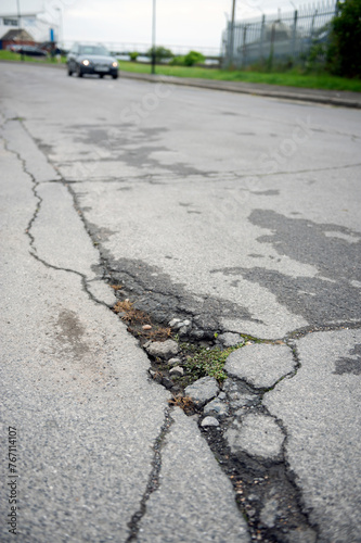 UK patchwork roads potholes, and recent repairs already falling apart.