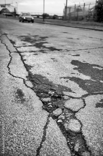UK patchwork roads potholes, and recent repairs already falling apart.