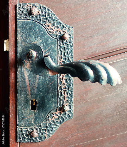 An antique lock on the doors