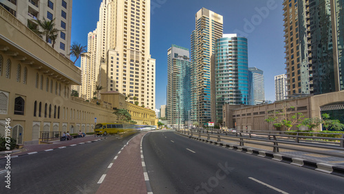 A view of traffic on the street at Jumeirah Beach Residence and Dubai marina timelapse hyperlapse, United Arab Emirates. © neiezhmakov
