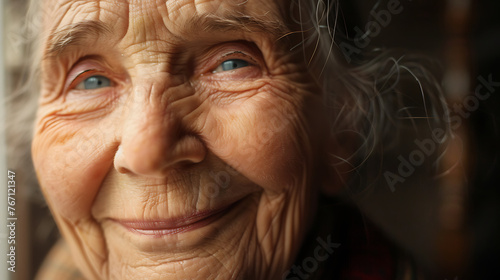 Close-up photo of old woman, beutiful old lady smiling  photo
