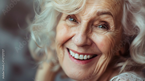 Close-up photo of old woman, beutiful old lady smiling  photo