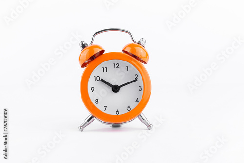 Orange The clock sets the time to 10.00. on white background isolate.