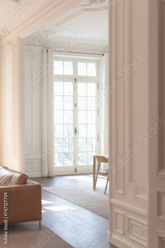 Inside of a white loft apartment with luxurious details in the Paris Apple store.