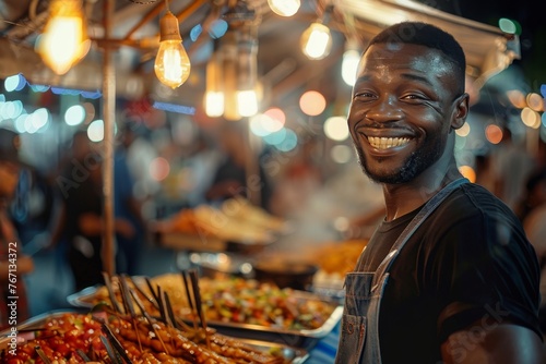 Happy young African American male street food seller  selective focus