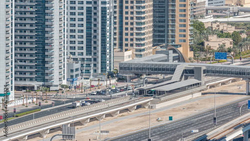 Aerial view of Dubai Tram in Dubai marina timelapse.