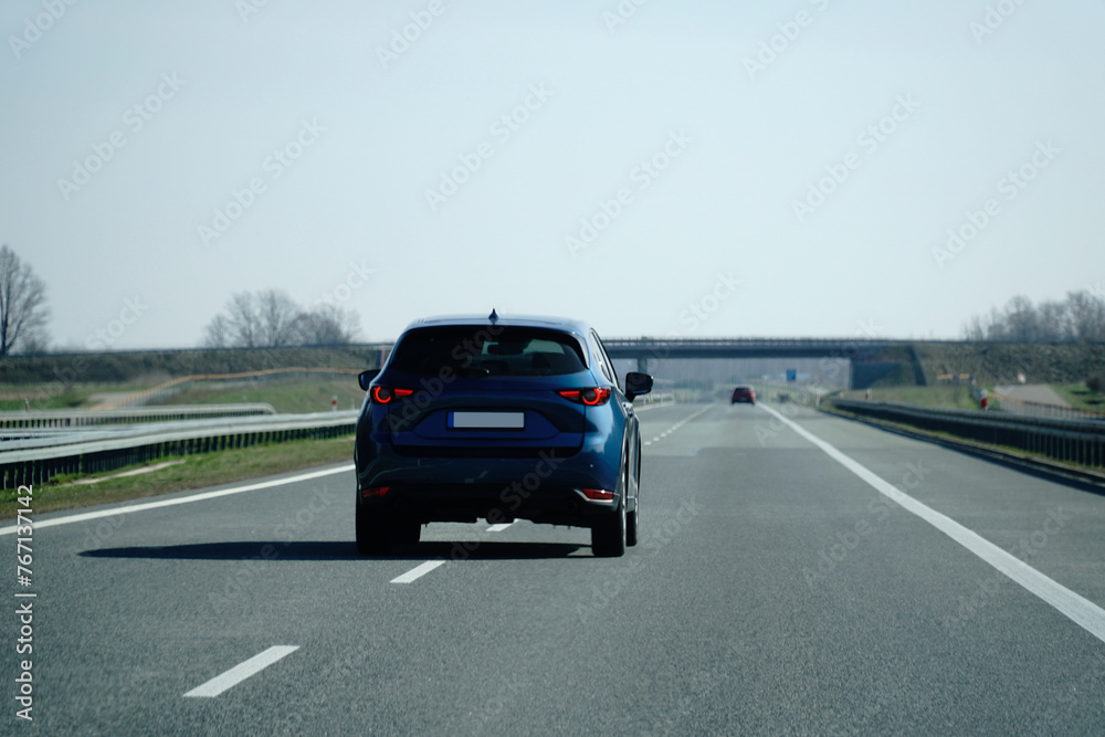 Car drives on a highway Car drives on a highway