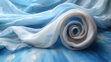  a close up of a blue and white cloth with a large white piece of cloth in the middle of it.