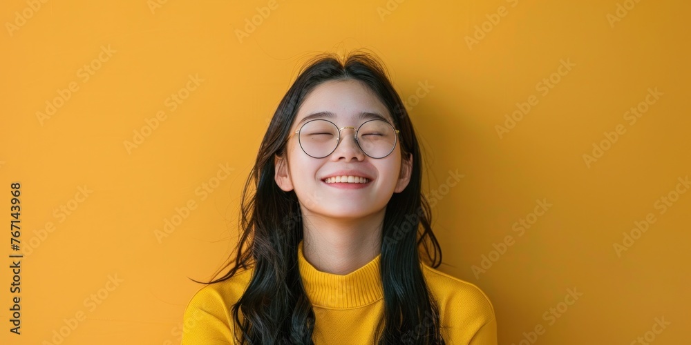 Smiling East Asian Woman with Glasses