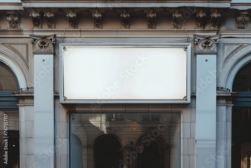 Blank store sign on a classic building facade