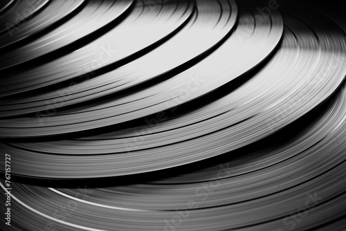 Intricate Black and White Close-up of Vintage Vinyl Records Stack