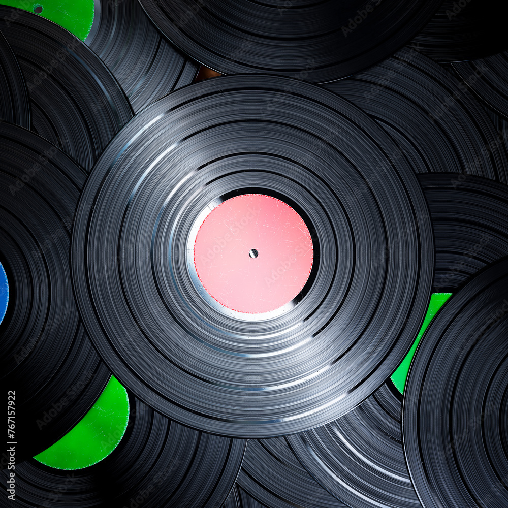 Exquisite Collection of Vinyl Records with Vibrant Label Colors on Display Exquisite Collection of Vinyl Records with Vibrant Label Colors on Display