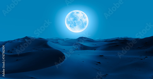 Beautiful sand dunes in the Sahara desert at sunrise with super full moon - Sahara, Morocco "Elements of this image furnished by NASA"
