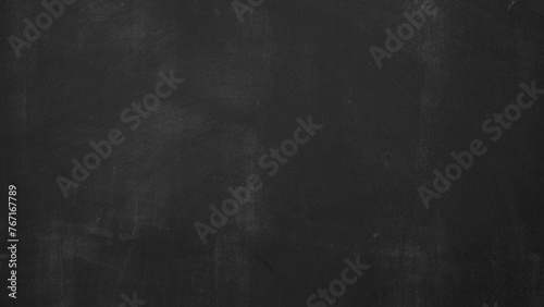Black scratched anthracite blackboard chalkboard with chalk, concrete wall texture background, education backdrop