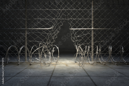 Dramatic Spotlight Illuminates a Damaged Chain Link Fence at Night