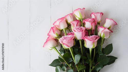 Graceful bouquet of pink roses against a pristine white backdrop