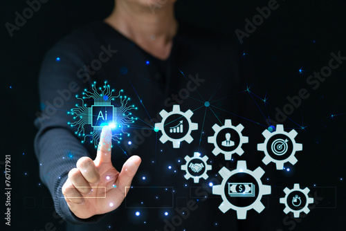 AI ,Business visionary points to AI letter icon on a world map, symbolizing the strategic utilization of AI in global business. Embrace innovation and navigate the future of intelligent technology