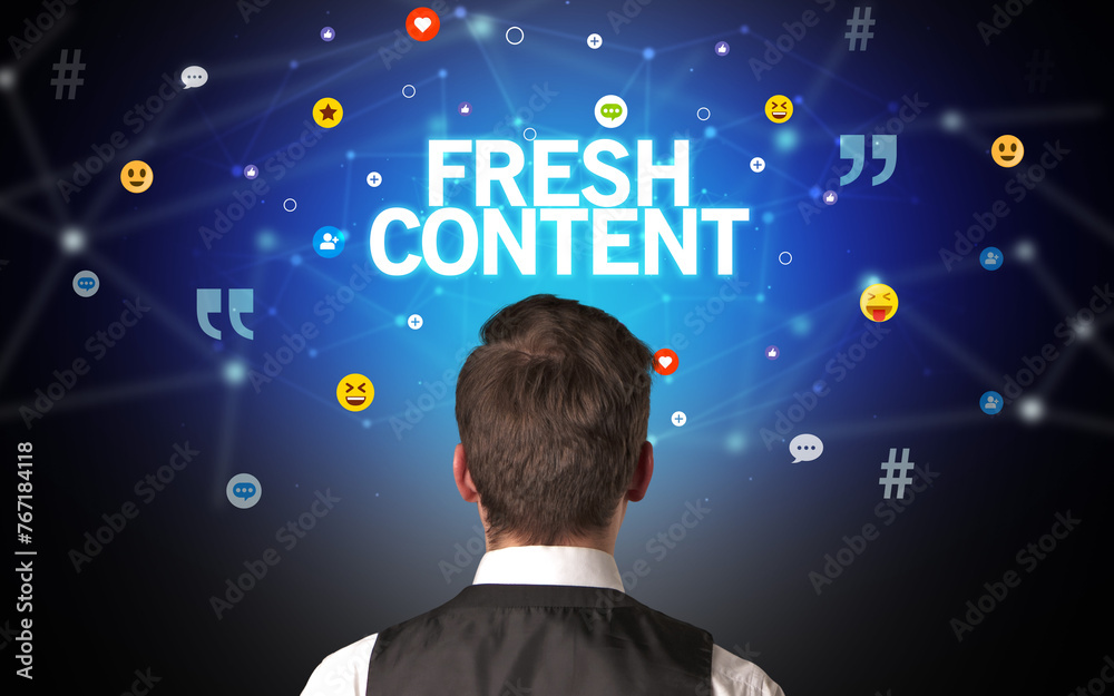 Rear view of a businessman, social media concept Rear view of a businessman, social media concept