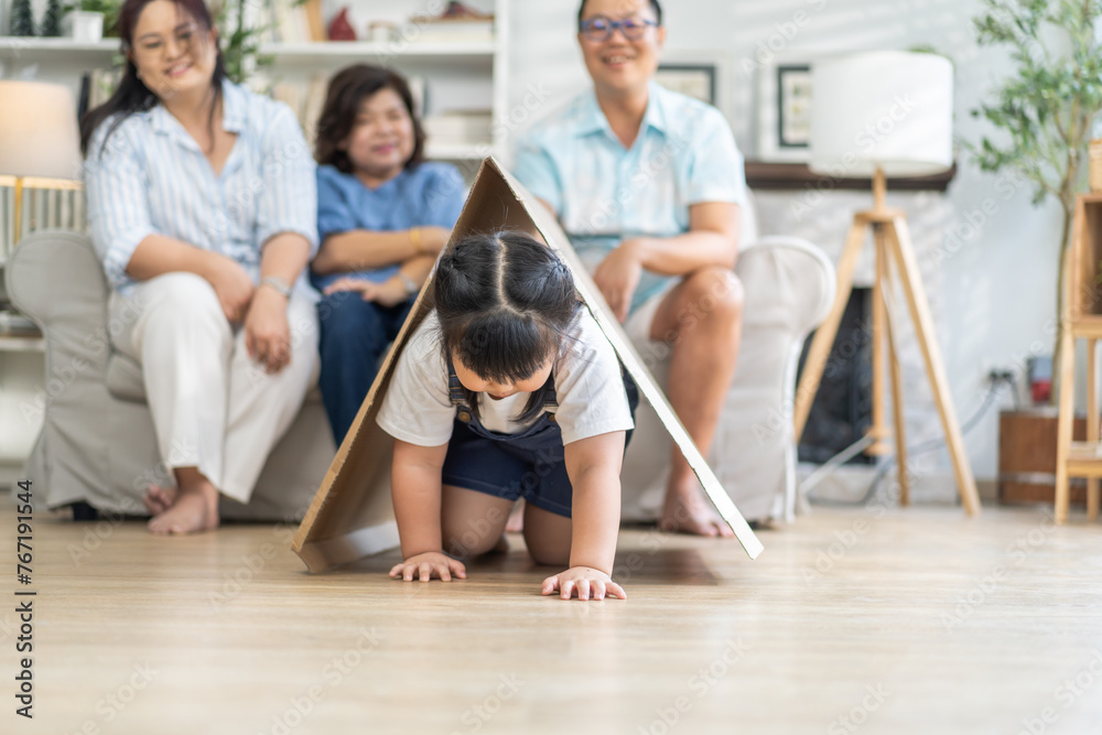 Portrait of enjoy happy love asian family father and mother with cute little asian girl child smiling play and having fun moments good time, care, kid, support, insurance, child, at home Portrait of enjoy happy love asian family father and mother with cute little asian girl child smiling play and having fun moments good time, care, kid, support, insurance, child, at home
