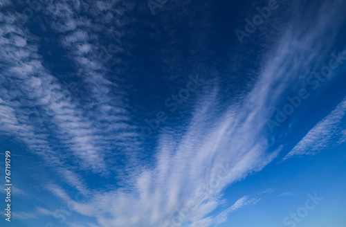 Spectacular waves sky. Undulatus wave clouds indicating a change of weather like rain or storm. Beautiful blue sky and white clouds landscape meteorological photo. photo