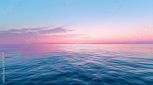 A beautiful blue ocean with a pink sky in the background. The sky is a mix of pink and purple  creating a serene and calming atmosphere. The water is calm and still