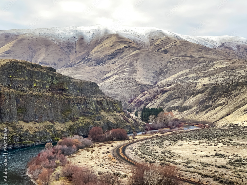 Yakima River and train tracks through a river valley in Washington State Yakima River and train tracks through a river valley in Washington State