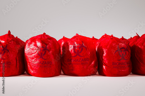 Obraz na płótnie Red Biohazard Bags for Infectious Waste Management and Disposal w salonie
