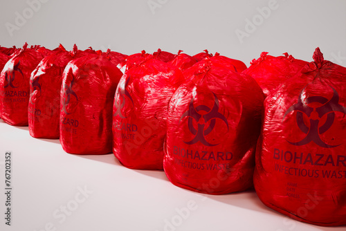 Obraz na płótnie Sealed Red Biohazard Bags Lined Up for Infectious Waste Disposal w salonie