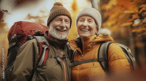 Romantic and elderly healthy lifestyle concept. Senior cheerful active smiling mature couple hiking 