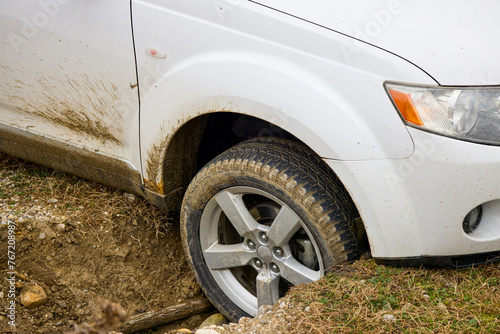 Off road SUV car crashed into a ditch on a track course