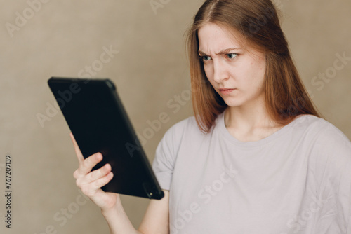 Portrait of young student actress learning role woman with digital tablet. Acting test casting film movie acting auditions.