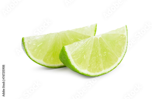 Citrus fruit. Slices of fresh lime isolated on white