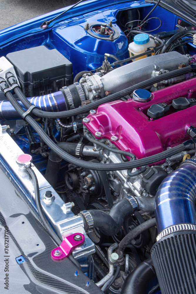 detail of a high performance race engine on a car detail of a high performance race engine on a car