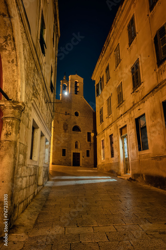 Amazing night view with the beautiful medieval architecture of the old town of Shibenik on the coast of the Adriatic Sea, Croatia.
