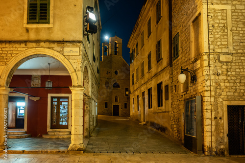 Amazing night view with the beautiful medieval architecture of the old town of Shibenik on the coast of the Adriatic Sea, Croatia.