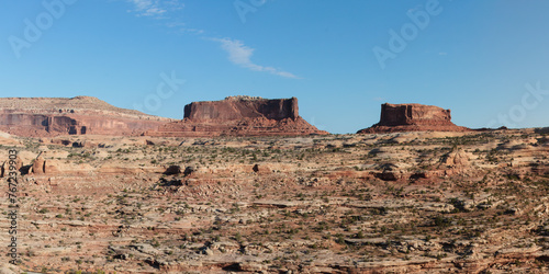 Travel and Tourism - Scenes of the Western United States. Red Rock Formations Near Canyonlands National Park, Utah.. Merrimac Butte on left. Monitor butte on right.