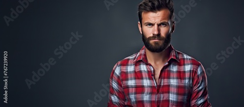 Man in plaid shirt with beard