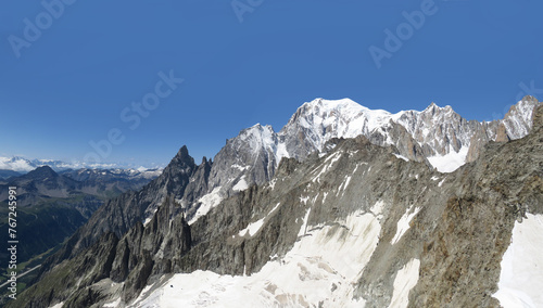 View of the Mont-Blanc (altitude: 4.810 m) the summer from the Pointe Helbronner. Alps Chain Mountains. Border between Italy and France.