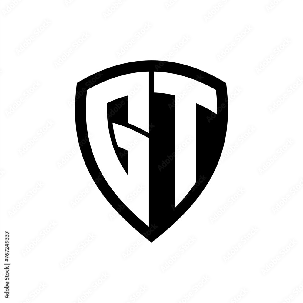 GT monogram logo with bold letters shield shape with black and white color design GT monogram logo with bold letters shield shape with black and white color design