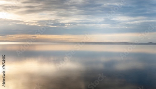 silver blue grey polished reflective steel surface with background horizon