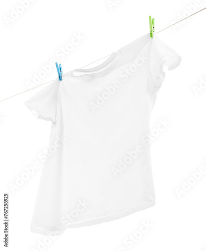 One t-shirt drying on washing line isolated on white, low angle view