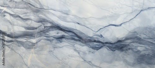 An close up view of a blue and white marble texture resembling a freezing snowcovered landscape. The pattern is reminiscent of clouds and cumulus formations on a windy slope © AkuAku