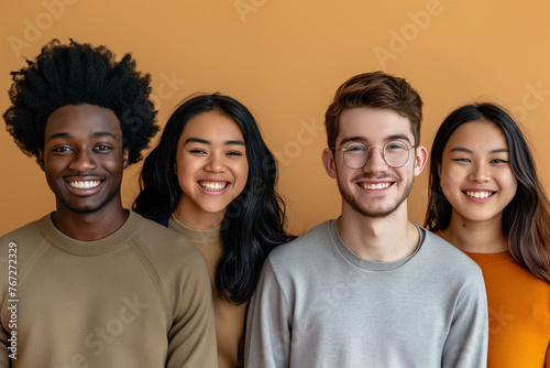 Group of positive handsome very different people, students, managers. Concept of diversity. Different hair style. Afro-american, Asian and Caucasian people.