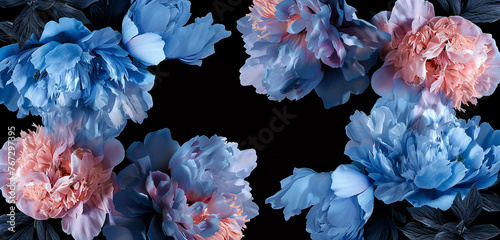 An artistic composition of blue and pink peony blossoms against a black backdrop, with a designated area for text on a blank label. photo