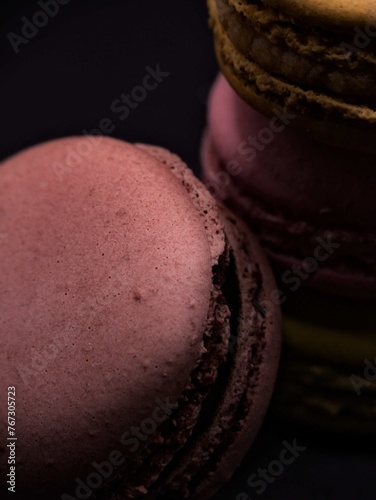 Typical French pastry - Set of macaroons on black background