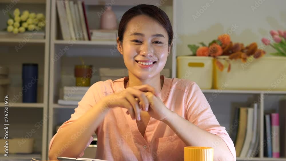 Young Asian businesswoman working late at midnight
